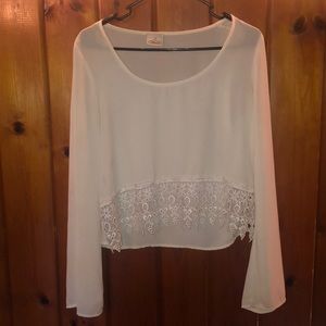 White long sleeve with lace at bottom